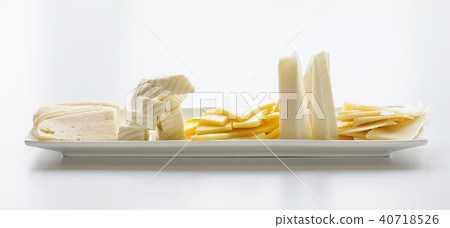 Cheese plate on a light background Cheese plate on a light background 40718526