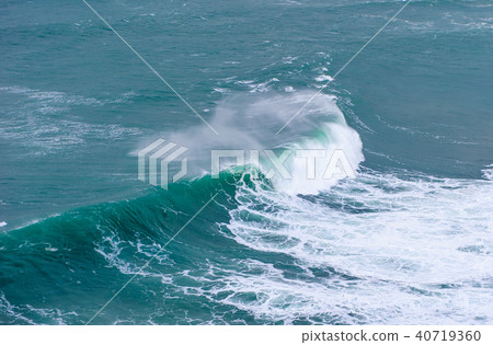 Huge ocean wave breaking in Nazare, Portugal 40719360