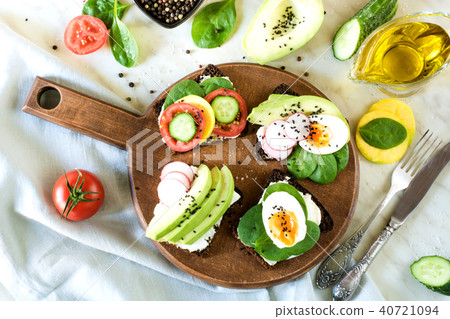 Different sandwiches with vegetables. Flat lay. Different sandwiches with vegetables. Flat lay. 40721094