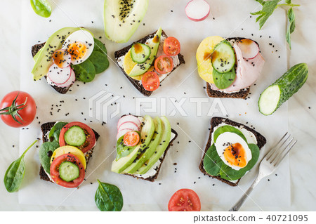 Homemade sandwiches with vegetables. Flat lay. Homemade sandwiches with vegetables. Flat lay. 40721095