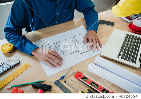 Architects man working with blueprints 40724554