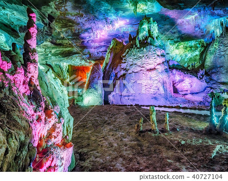 Wonderful Prometheus Cave. Stalactites and stalagmites in the illuminated cave 40727104