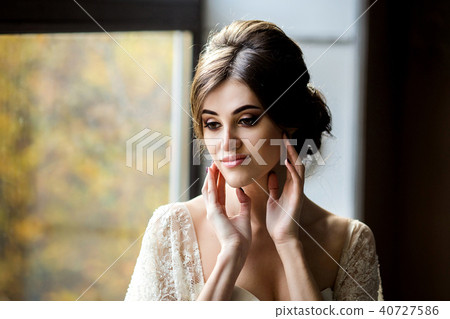 Portrait of beauty bride in white dress. 40727586