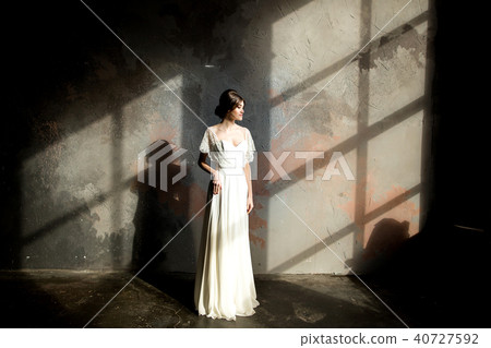 Portrait of beauty bride in white dress. 40727592