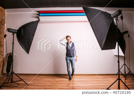 Portrait of a young hipster man or model in a studio. Copy space. Portrait of a young hipster man or model in a studio. Copy space. 40728180