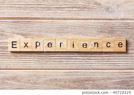 experience word written on wood block. experience word written on wood block. 40728329