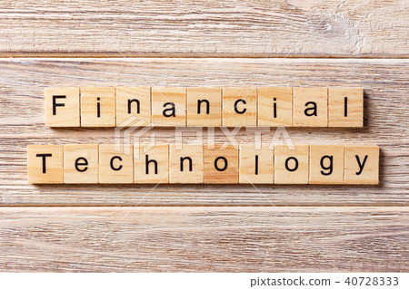 Financial Technology word written on wood block Financial Technology word written on wood block 40728333