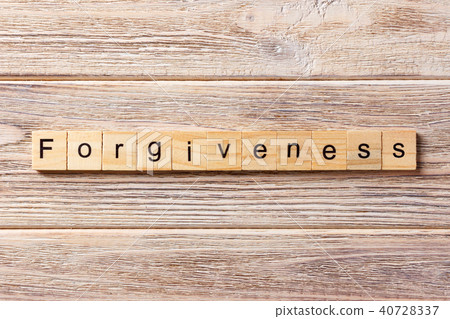 forgiveness word written on wood block. forgiveness word written on wood block. 40728337