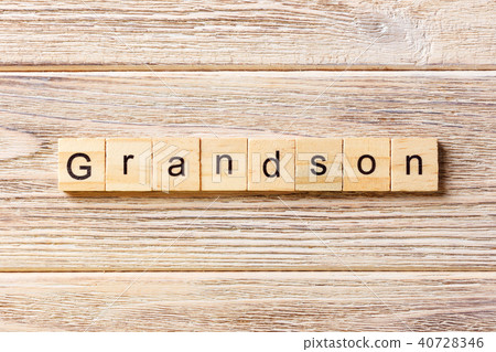 grandson word written on wood block 40728346