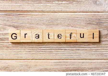 Grateful word written on wood block. Grateful word written on wood block. 40728347