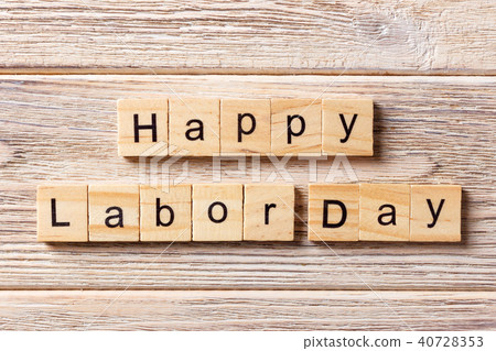 Happy Labor Day word written on wood block Happy Labor Day word written on wood block 40728353