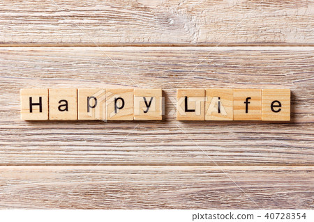 happy life word written on wood block. happy life word written on wood block. 40728354