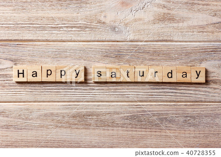 Happy Saturday word written on wood block. Happy Saturday word written on wood block. 40728355
