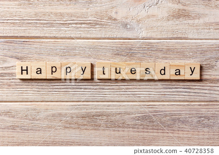 Happy Tuesday word written on wood block. Happy Tuesday word written on wood block. 40728358