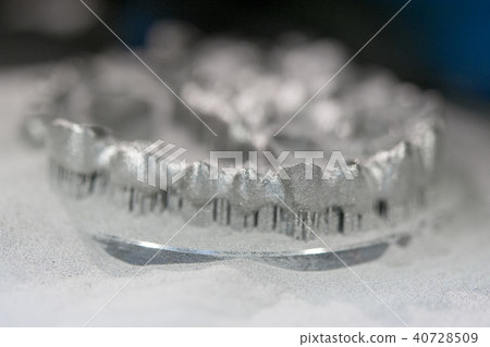 Object printed on metal 3d printer, laser sintering machine for metal close-up. 40728509