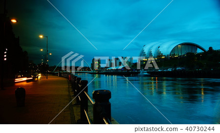 View of Newcastle at dusk, under the bridge 40730244