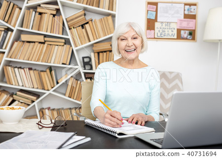 Jolly senior freelancer completing project Jolly senior freelancer completing project 40731694