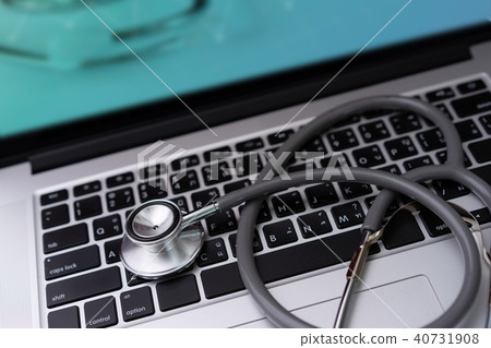 stethoscope on laptop Doctor working in hospital 40731908