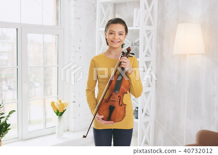 Amazing brunette going to play music Amazing brunette going to play music 40732012
