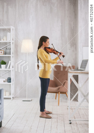 Attentive brunette learning new work 40732084
