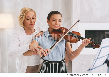 Attentive blonde helping her follower 40732134