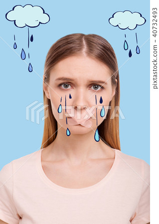 Portrait of upset girl with plastered mouth Portrait of upset girl with plastered mouth 40732493