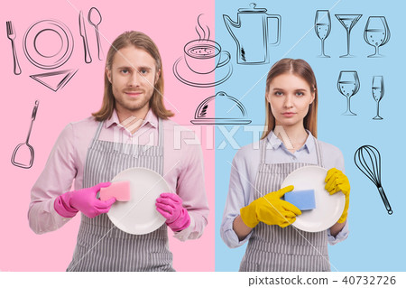 Portrait of positive waiters washing dishes Portrait of positive waiters washing dishes 40732726