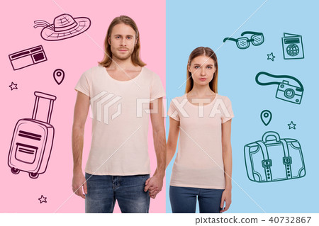 Young couple holding hands while planning the journey Young couple holding hands while planning the journey 40732867