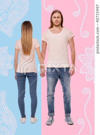 Handsome man looking proud while standing with his pretty girlfriend 40733497