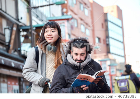 Man traveling in wheelchair 40738385