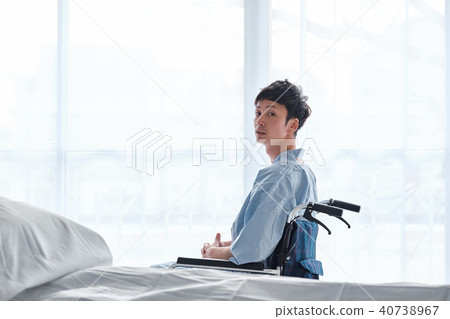 Men in a wheelchair 40738967