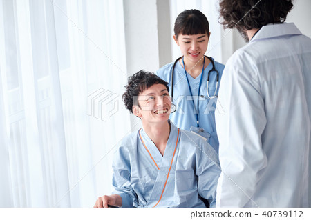 Men in a wheelchair Men in a wheelchair 40739112