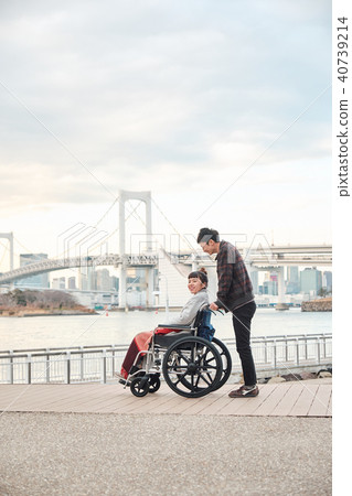 Wheelchair women and men Wheelchair women and men 40739214