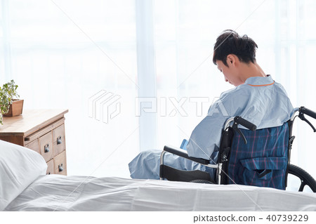 Men in a wheelchair 40739229