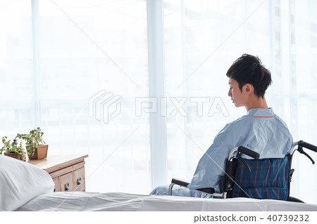 Men in a wheelchair 40739232