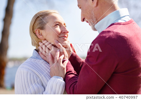 Happy nice man looking at his wifes face 40740997