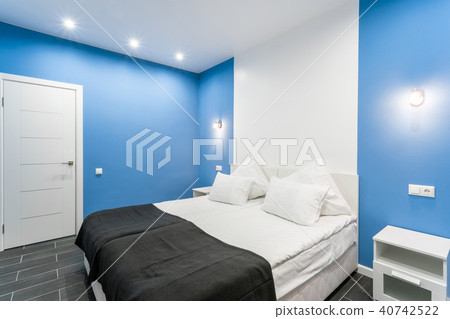 Hotel standart room. modern bedroom with white pillows. simple and stylish interior. interior Hotel standart room. modern bedroom with white pillows. simple and stylish interior. interior 40742522