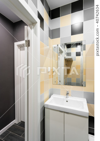 Bathroom with shower, toilet bowl and sink. Hotel standart bedroom. simple and stylish interior Bathroom with shower, toilet bowl and sink. Hotel standart bedroom. simple and stylish interior 40742634