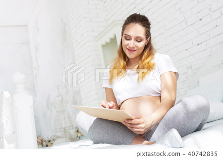 Glad pregnant woman padding pregnancy diary Glad pregnant woman padding pregnancy diary 40742835