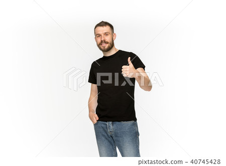Closeup of young man's body in empty black t-shirt isolated on white background. Mock up for disign 40745428