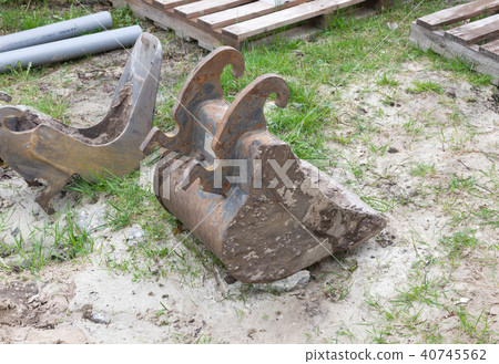 Small crane is leveling ground 40745562