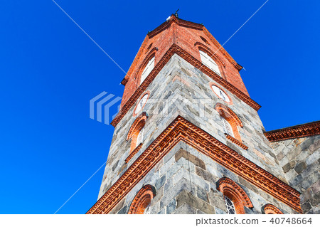 Juva Church under blue sky in summer day Juva Church under blue sky in summer day 40748664