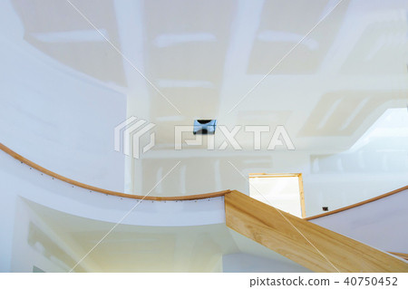 Front view of gypsum wall with joints at building 40750452
