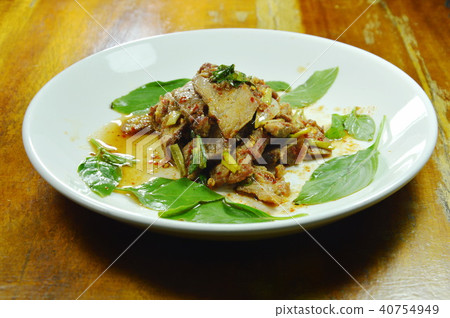 Thai spicy slice grilled pork salad on plate 40754949