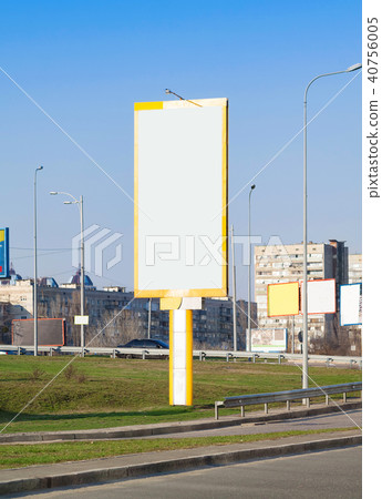 Blank vertical billboard near a highway. Blank vertical billboard near a highway. 40756005