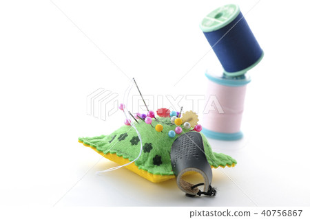 Pin cushion and thread and throw 40756867