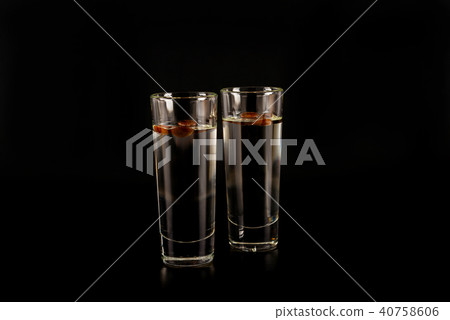 aromatic anise alcohol with coffee beans in glass 40758606