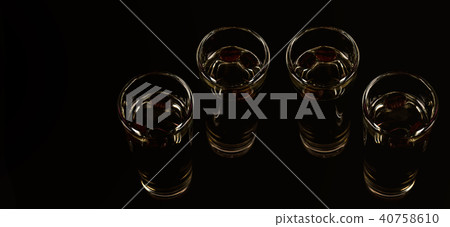 aromatic anise alcohol with coffee beans in glass aromatic anise alcohol with coffee beans in glass 40758610