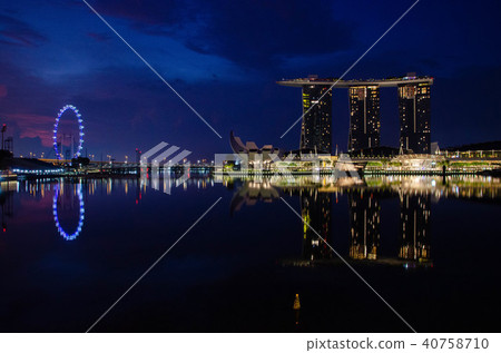 Marina Bay Sands and Singapore Flyer (Singapore) reflected on the lake Marina Bay Sands and Singapore Flyer (Singapore) reflected on the lake 40758710
