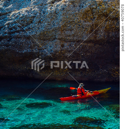 Senior kayaker on a kayak by the sea 40759078